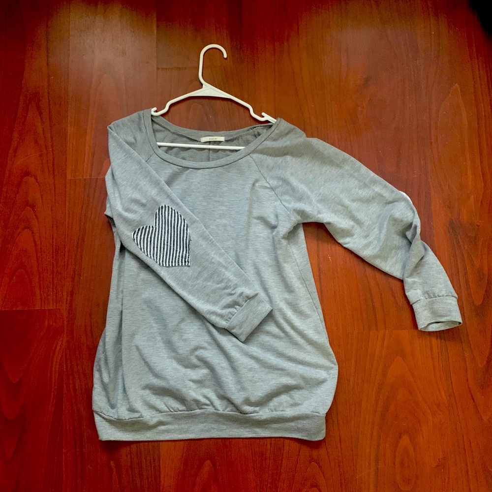 Pullover with heart elbow patches